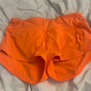 Neon orange speed up shorts lululemon